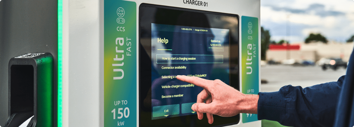 Charger screen with 'Help' options displayed including: How to start a charging session, Connector availability, Vehicle charging compatability, and Become a Member