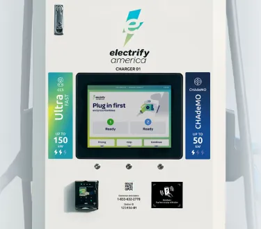 Electrify America charging display portraying the teal ultra-fast and blue CHAdeMO charging labels