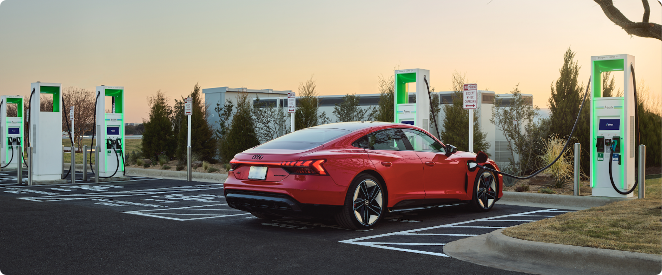 Audi Etron EV charging at an Electrify America charging station