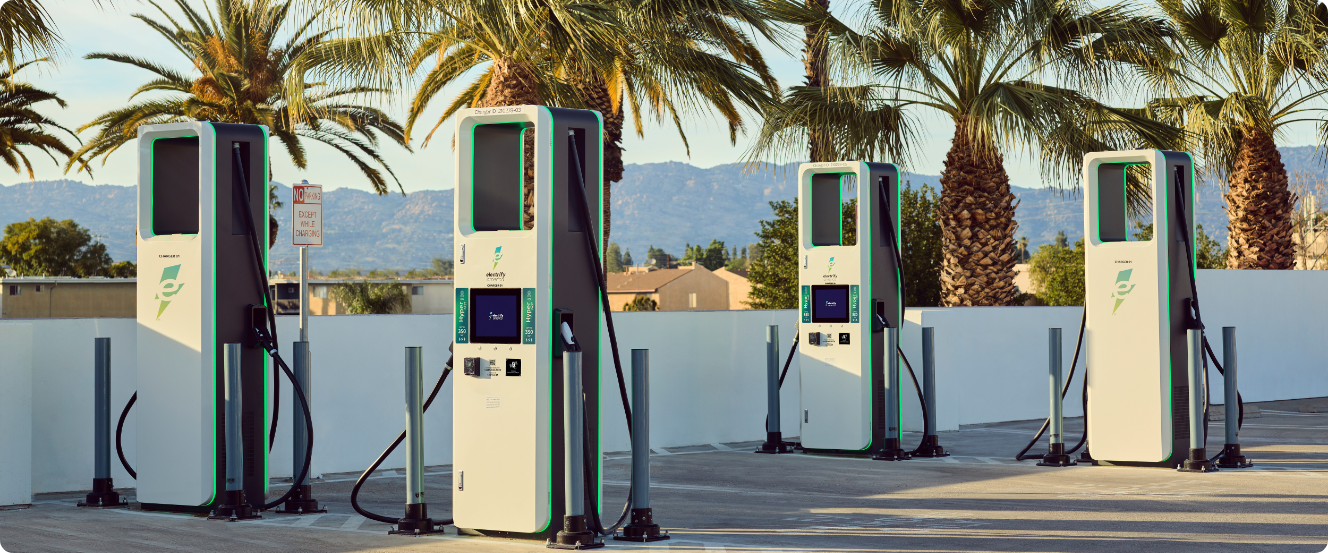 Electrify America charging stations at dusk