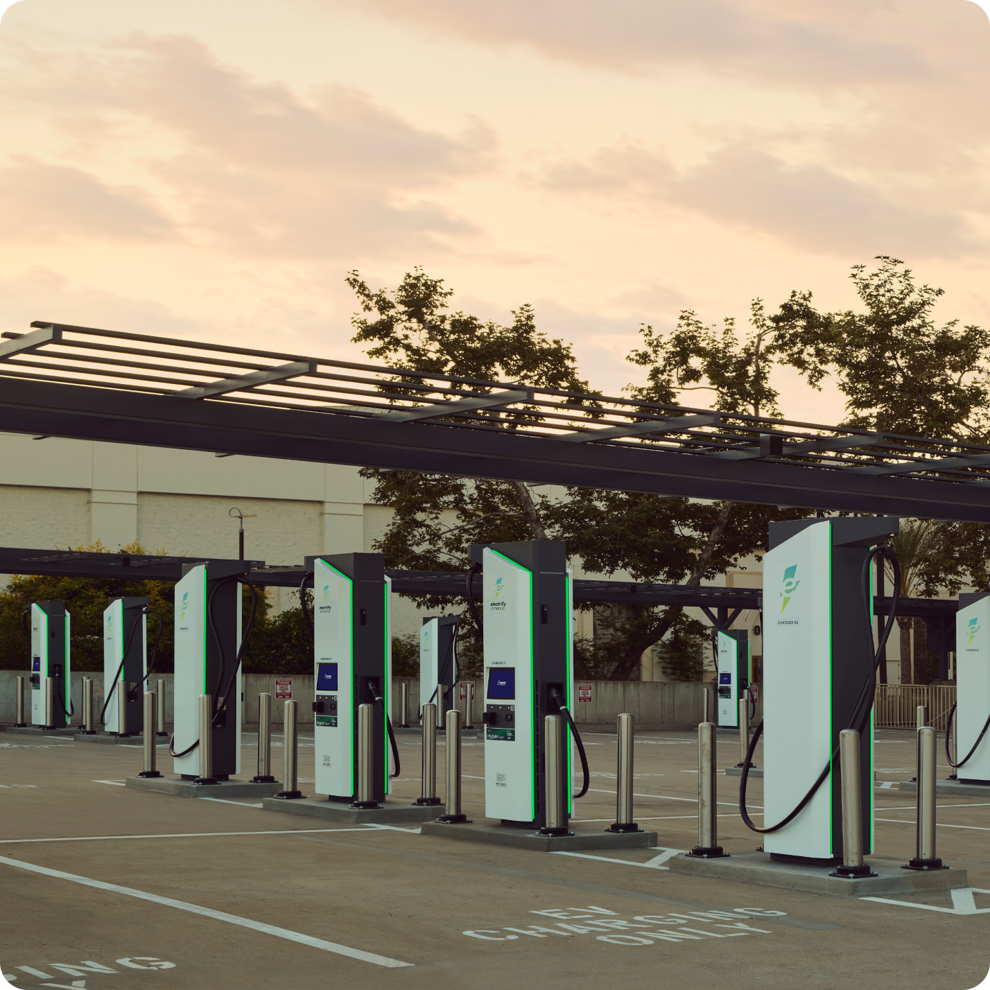 A large Electriy America charging station in a parking lot