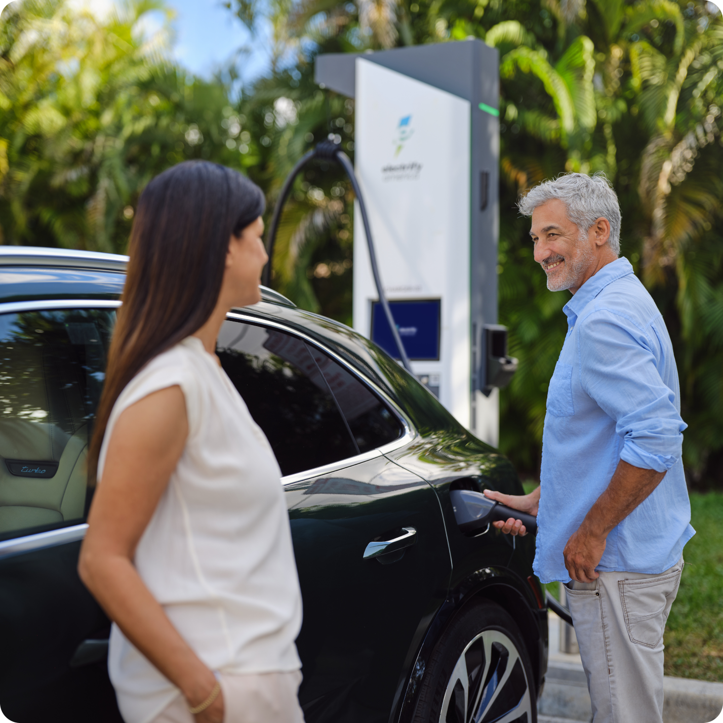 A picture of the renewable energy farm. A sign says Solar Glow 1.